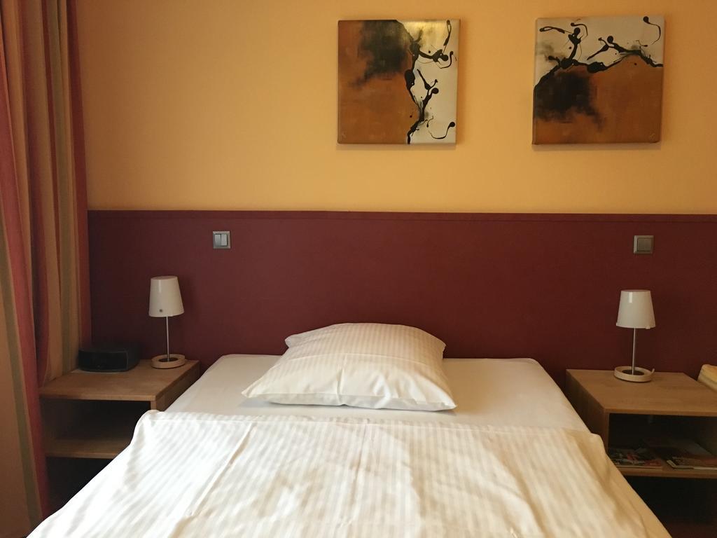 Essentis Ecohotel Берлин Номер фото